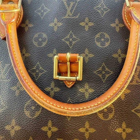 Louis Vuitton Rivoli Monogram Handbag - Picture 2 of 16